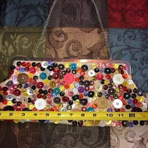 Aldo Button Clutch